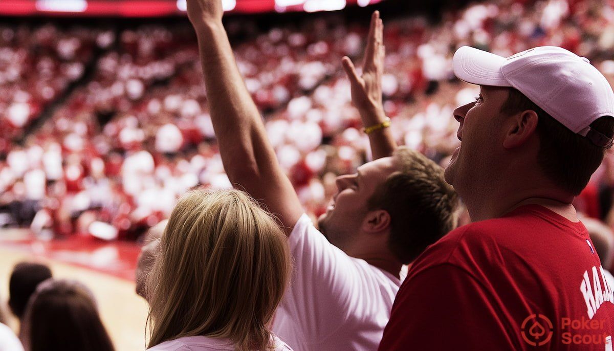 Two Arizona sports betting fans at a basketball game