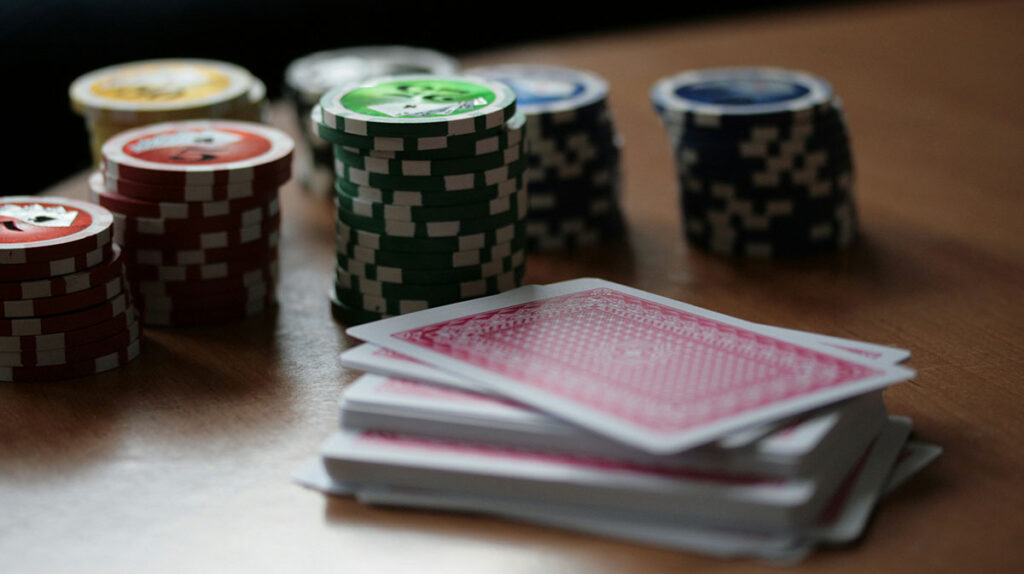 Poker Cards Chips Dim Lighting