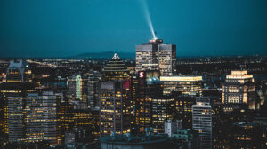The skyline of downtown Montreal at night, seen from the Mount Royal lookoff.