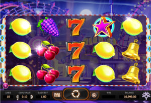 Slot machine interface with a carnival theme. Symbols include lemons, cherries, grapes, gold bells, and stars. Three sevens are prominently displayed.