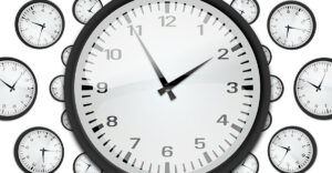 Many clocks white face black hands