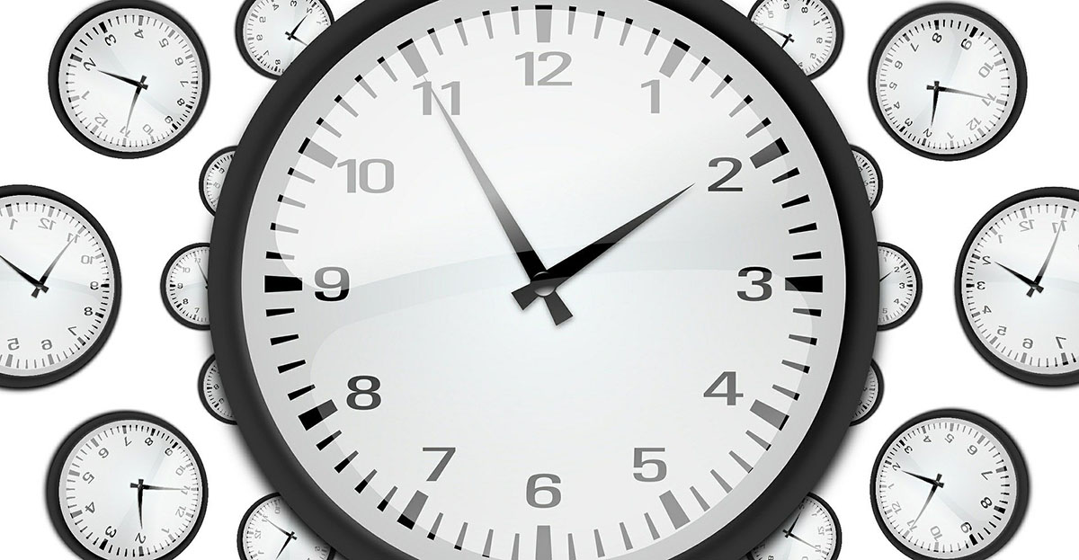 Many clocks white face black hands