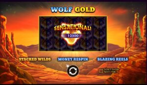 Slot game screen showing a "Sensational!" win of 12,500 points with wolf icons. Background features a dramatic sunset over rocky canyons.
