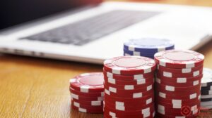 poker chips and laptop