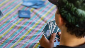 Kid playing a poker game