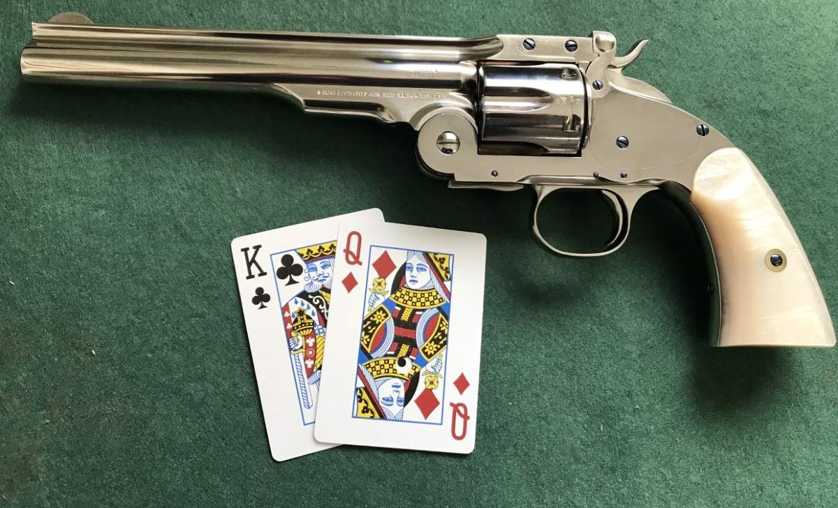 A gun at a poker table