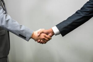 Two people shaking hands