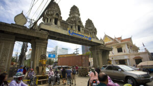 The Cambodian border gate in Poipet City, with the customs office visible in the background.