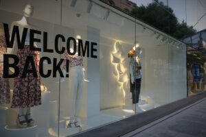 Welcome Back sign at a store