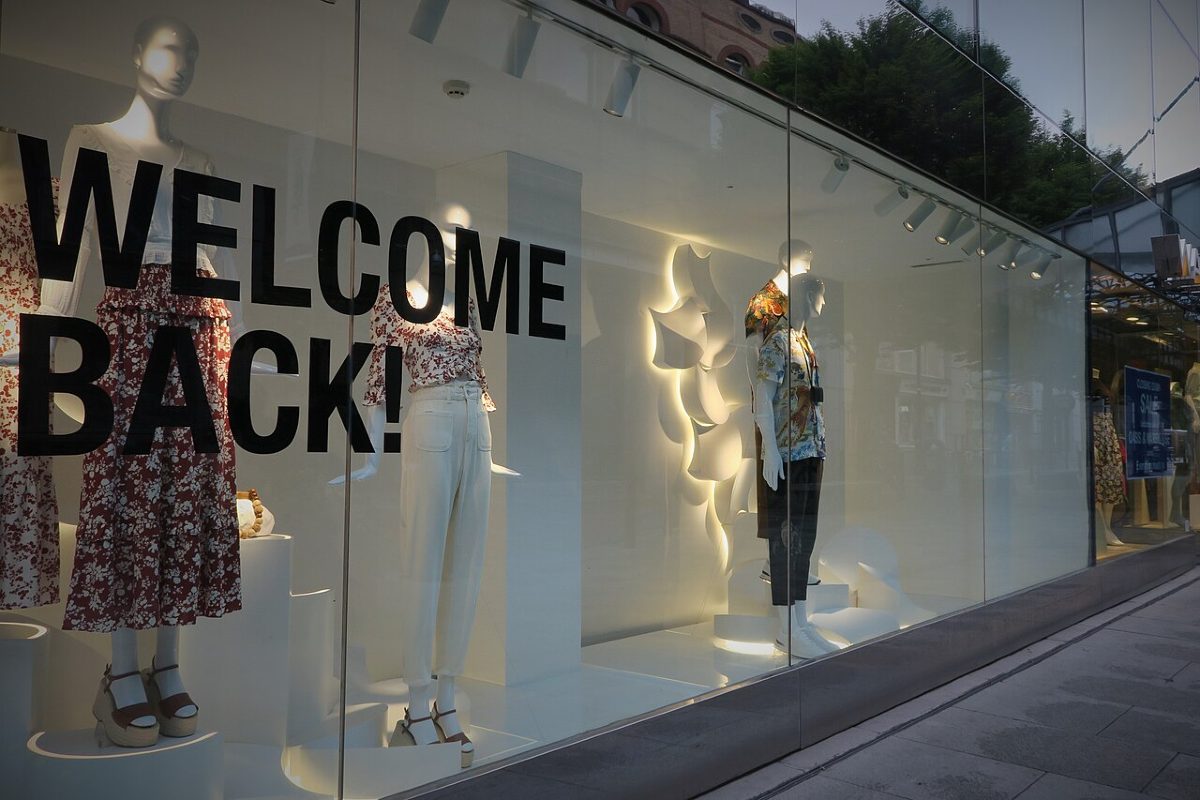 Welcome Back sign at a store