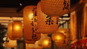 A collection of orange-lit Chinese lanterns.
