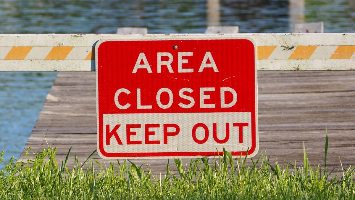 A sign that says 'area closed.'