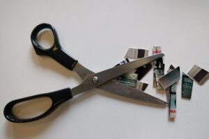 Scissors and a cut-up credit card