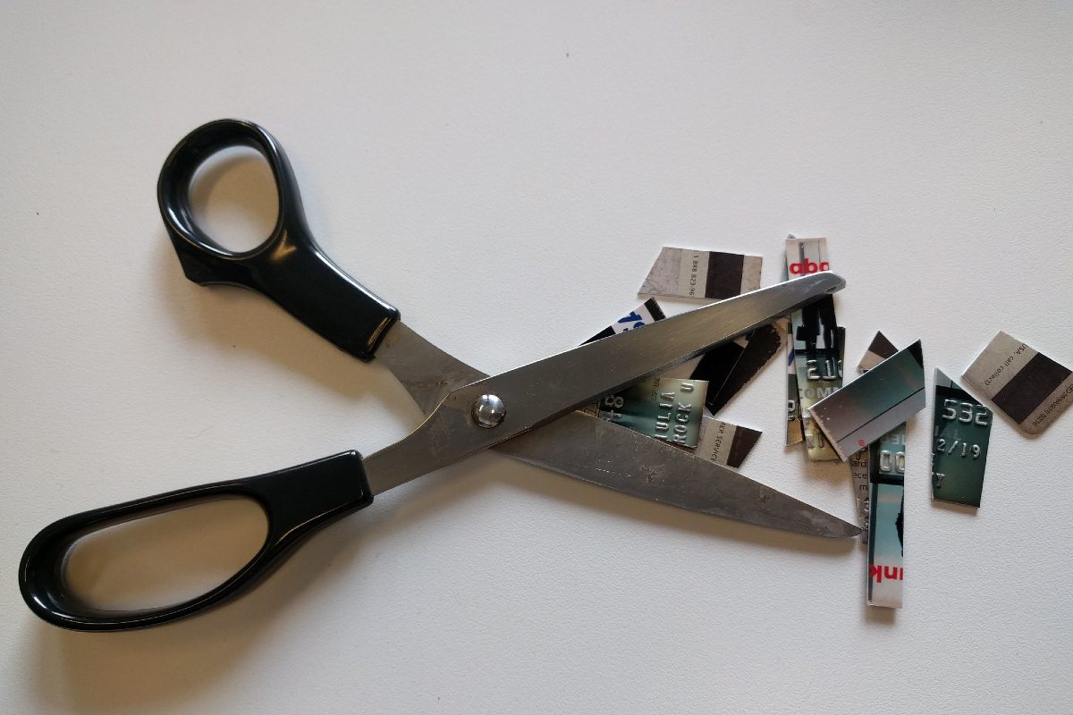 Scissors and a cut-up credit card