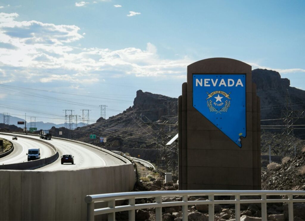 A sign welcoming drivers to Nevada.