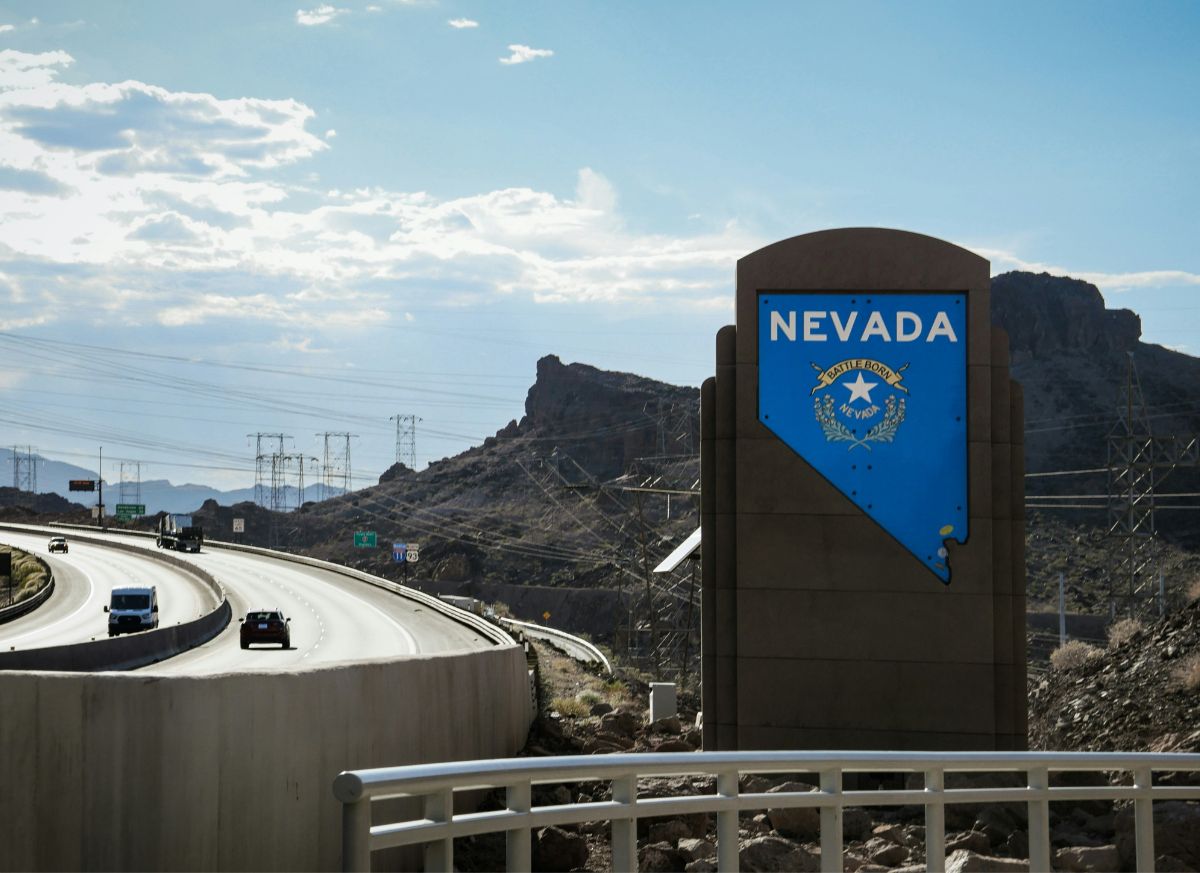 A sign welcoming drivers to Nevada.