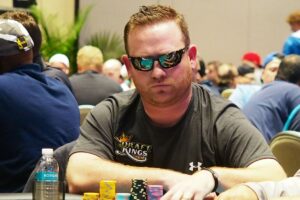 Poker player Andrew Atkinson with a DraftKings patch on.