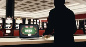 Anonymous poker player moves from casino slots to an online table beside an eighth bracelet trophy